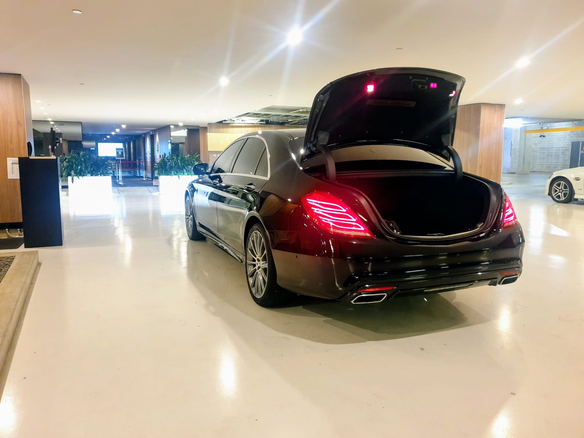 Mercedes Benz S Class in luxury hotel lobby
